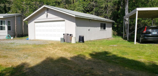 7055 TAKILMA RD, CAVE JUNCTION, OR 97523, photo 4 of 28