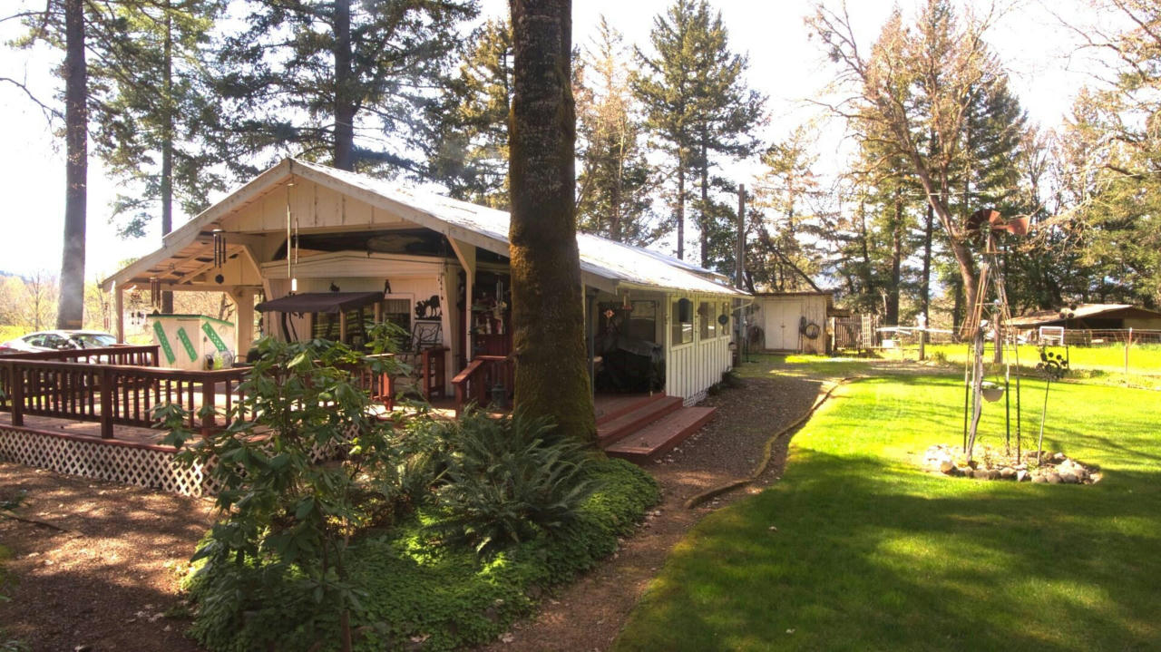 5048 TAKILMA RD, CAVE JUNCTION, OR 97523, photo 1 of 24