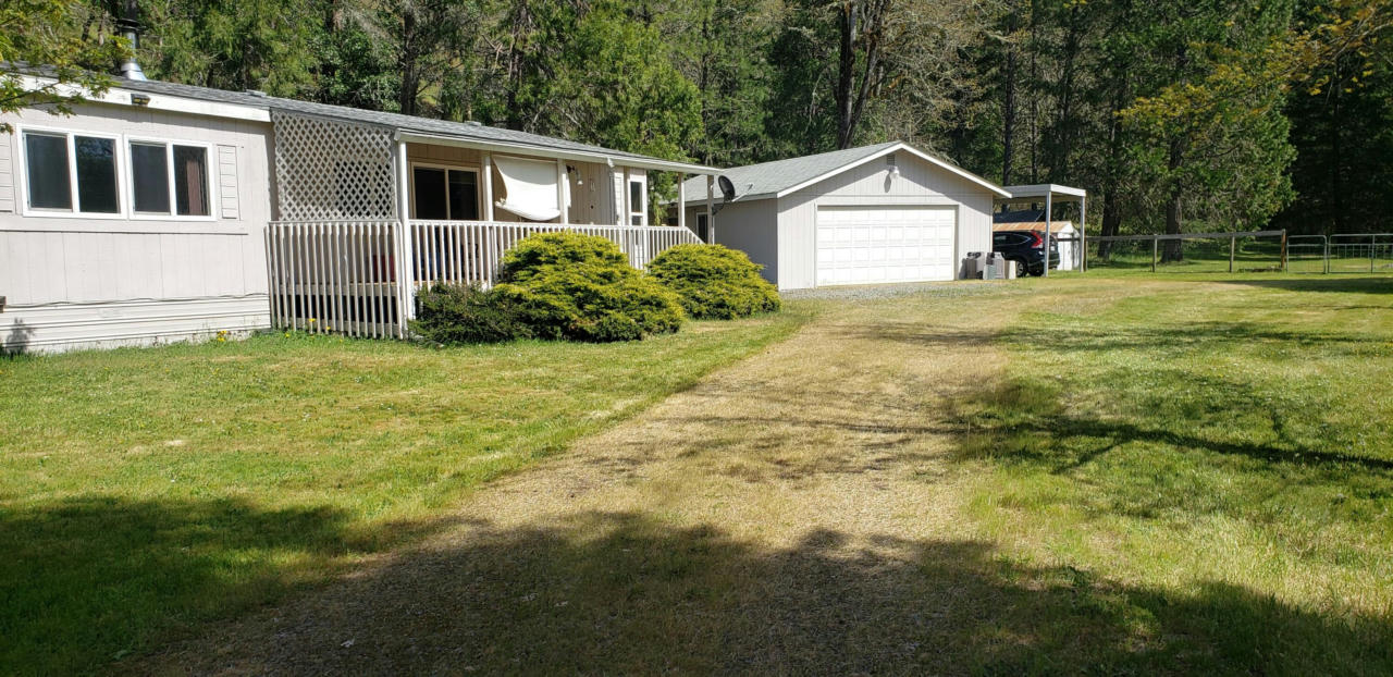 7055 TAKILMA RD, CAVE JUNCTION, OR 97523, photo 1 of 28
